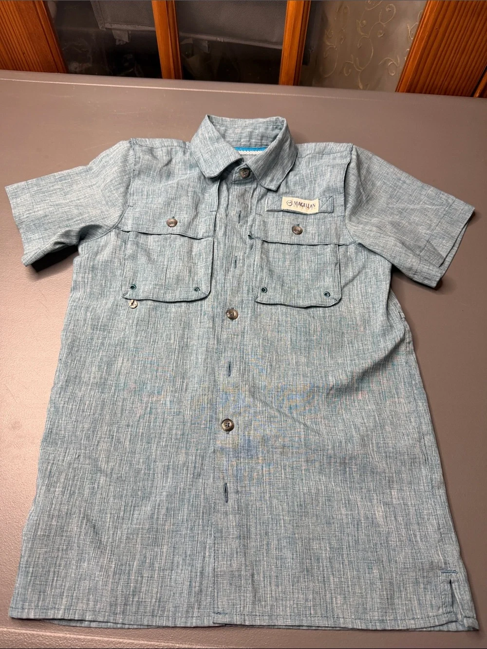 Kid’s Magellan Outdoors Short-Sleeve Button-Front Shirt. Light Blue Heather XS